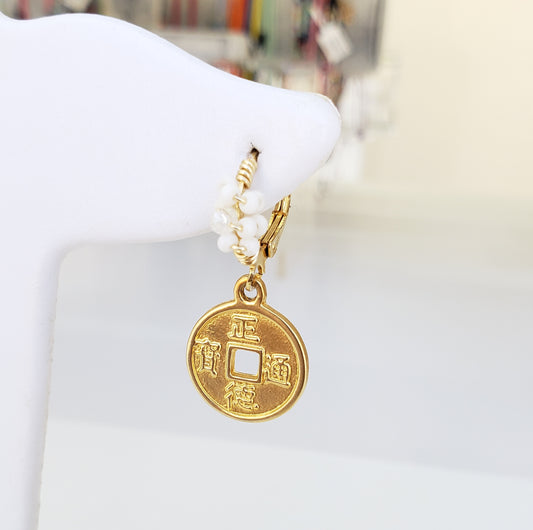 Aretes moneda china