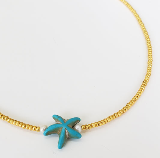 Choker dorado estrella azul