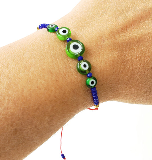 Pulsera ojo cristal color y c. azul