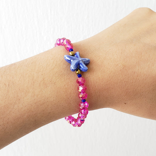 Pulsera estrella mar crist rosa